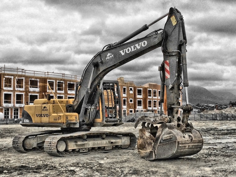 Foap-Volvo_excavator_construction_site_for_new_development