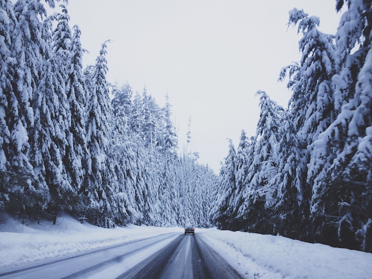 Spotted car in snowy road 